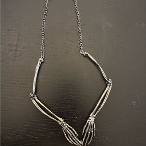 Skeleton Hand Necklace in Silver